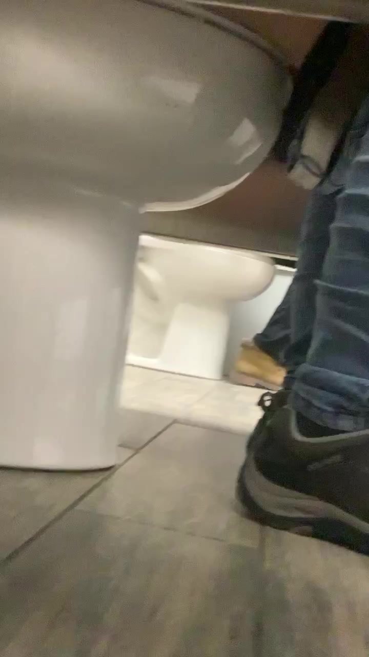 Watching wife public washroom mall