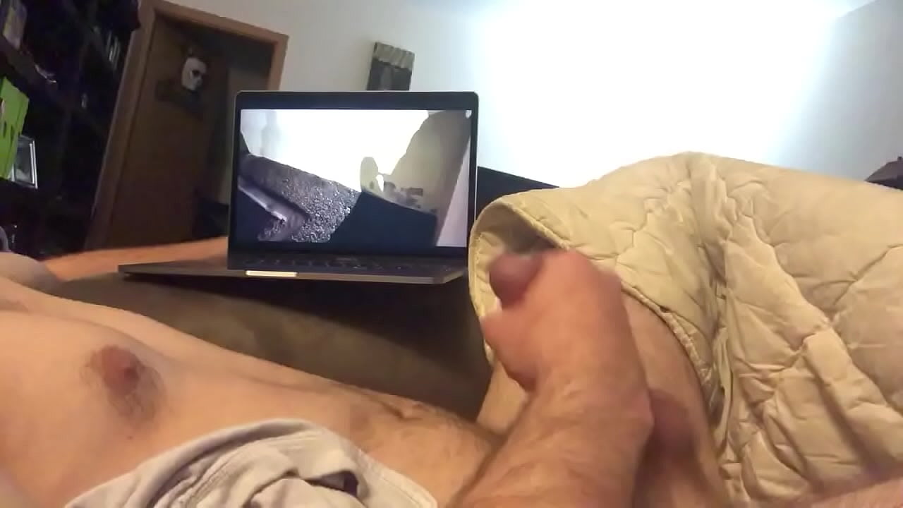 Touching cock while watching porn